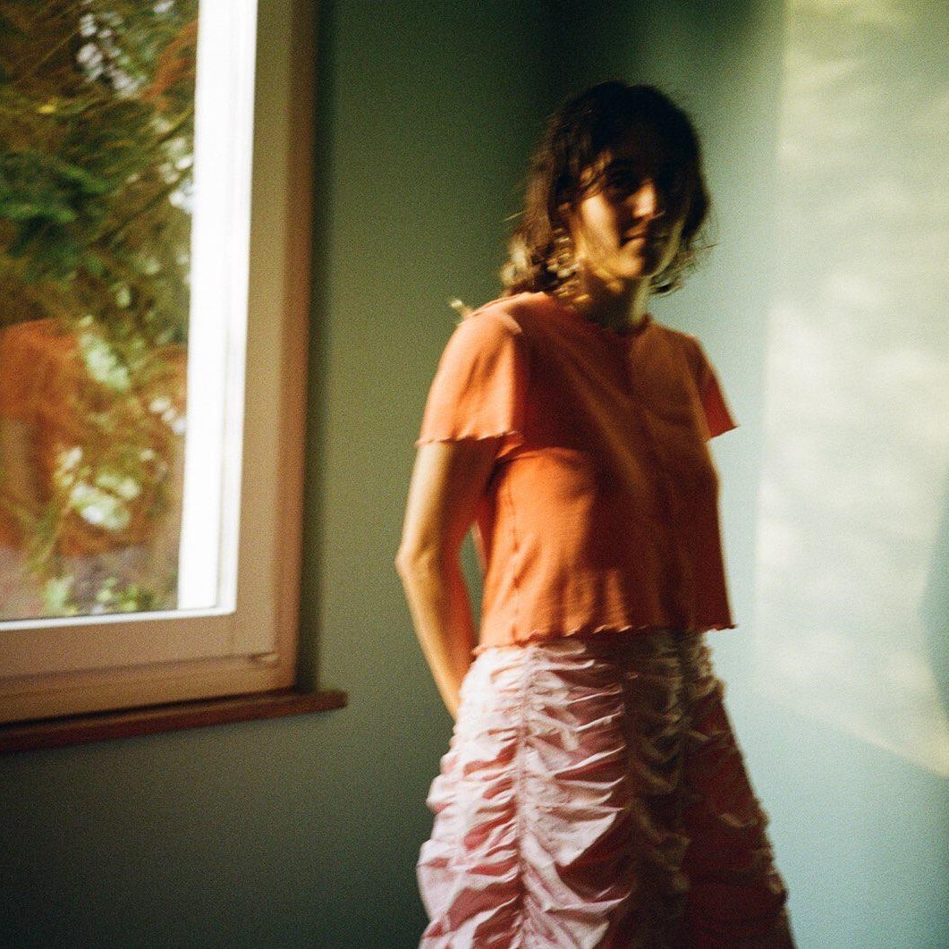 artist in front of window
