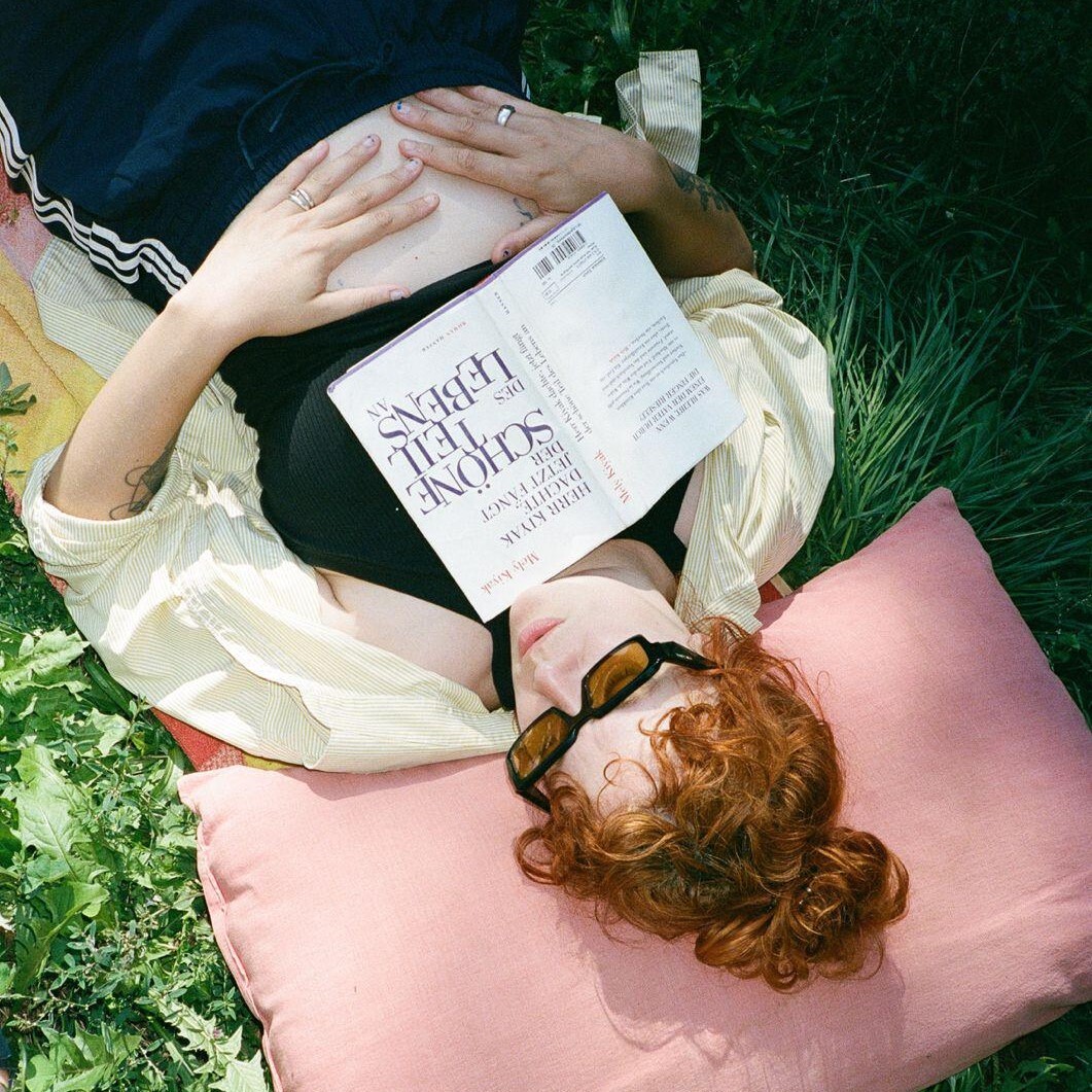 artist reading a book